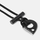 An Überleben ferro rod - the Leicht - is a small necklace fire starter. It consists of a black 550 paracord lanyard threaded through a short ferro rod and a small, teardrop shaped striker. This little tool is great for bushcraft/survival situations.