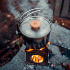 Überleben Stainless Steel Kessel Pot on a Stoker Stove; the perfect camping setup.